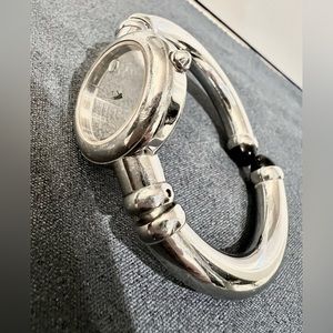 Movado Bareleto Ladies Watch. Silver. Mirror face. Needs new battery.